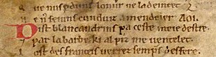 Detail of manuscript showing "AOI" at the end of the second line La Chanson de Roland AOI.jpg