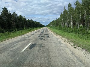 Latvian regional road P86 in 2020, uneven and over-patched