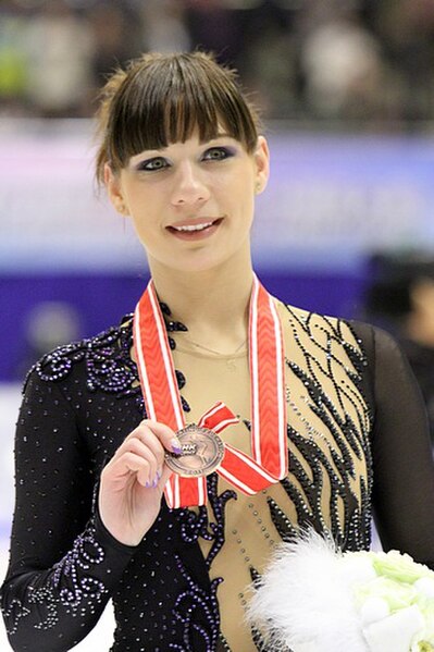 Leonova with a bronze medal at the 2011 NHK Trophy.
