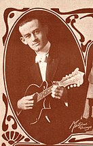 Lloyd Loar in 1918 with Gibson F-4 mandolin