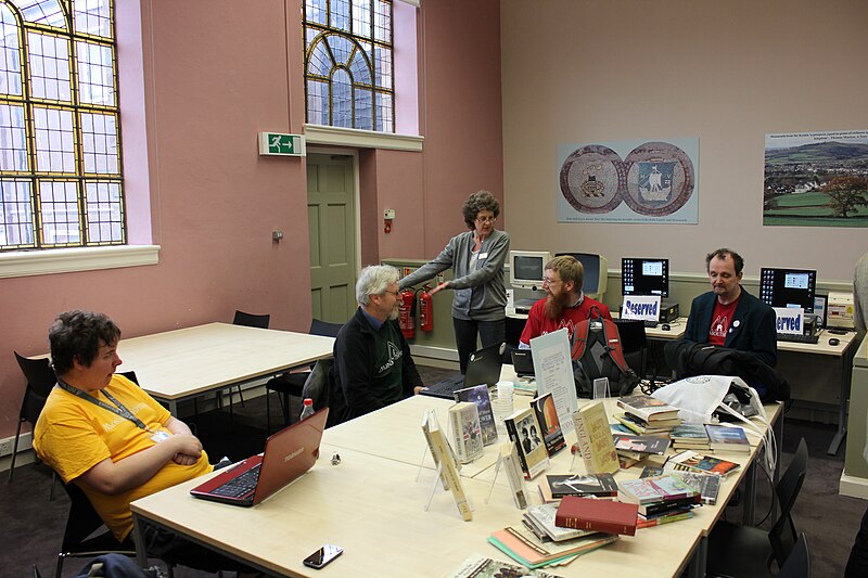 File:MonmouthpediA day volunteers and public in Monmouth library.JPG