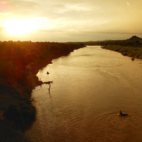 Sunsubiro super la Olifants-rivero