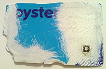 An RFID tag, exposed by the damage to this Oyster card Oyster card partially destroyed.jpg