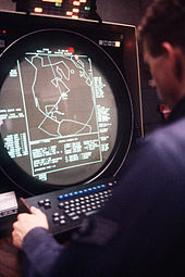 1986 operator and AN/FPS-115 console. Pave Paws Radar Screen.jpg