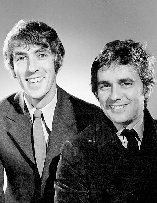 Moore (right) with Peter Cook in 1969. Their success was based on the contrast between Moore's buffoonery and Cook's deadpan monologues.