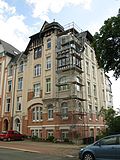 Apartment building in semi-open development, part of a double apartment building