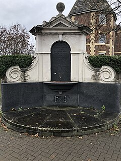 Drinking fountain erected to commemorate the 1897 Diamond Jubilee of Queen Victoria and restored for the Silver Jubilee of Elizabeth II in 1977 Queen Victoria and Elizabeth II memorial Kirkdale Sydenham 7 Dec 2021.jpg