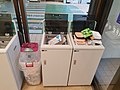 Recycling bins in a Japanese supermarket- caps, juiceboxes, styrofoam trays.jpg