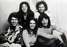 Renaissance, 1979. Clockwise from upper left: Terry Sullivan, Michael Dunford, John Tout, Annie Haslam, and Jon Camp. Renaissance "Azure D' Or" (1979 Sire press photo).jpg