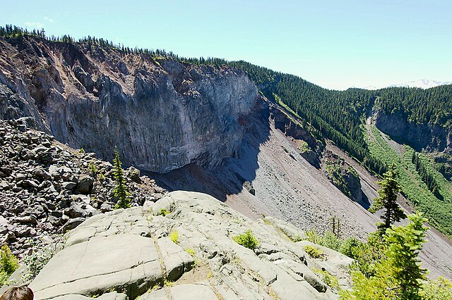 The edge of The Barrier ice-marginal lava flow. Debris extending down the edge of The Barrier is where historical landslides have occurred.