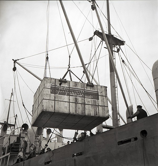 Plymouth CKD crate being unloaded in a Swedish harbor