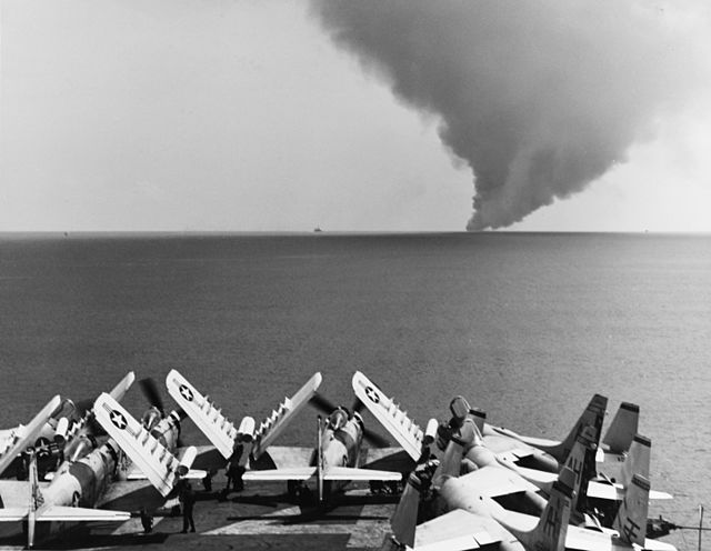 The smoke plume from the burning USS Forrestal, the worst US carrier fire since World War II, photographed from USS Oriskany.
