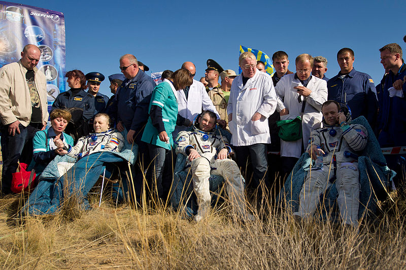 File:Soyuz TMA-21 crew after landing.jpg