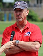 Steve Grogan's 16 seasons with the Patriots is second only to Tom Brady. He was known as one of the toughest players of his era, with his willingness to scramble out of the pocket as well as his prowess to come back from multiple injuries sustained in an era with much less player safety. Steve Grogan (18806447086) (cropped).jpg