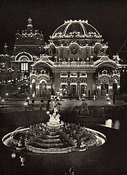 Nighttime photo of electrified Temple of Music.