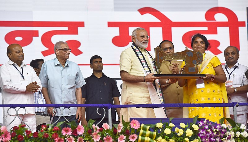 File:The Prime Minister, Shri Narendra Modi distributing the aids and assistive devices, at the Samajik Adhikarita Shivir in Race Course Ground, Rajkot, Gujarat (5).jpg