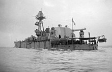 The stern of HMS Lord Clive showing her BL 18-inch gun on its fixed mounting, November 1918 The Surrender of the German High Seas Fleet, November 1918 Q19294.jpg