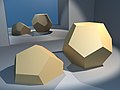 Set of Platonic solids; renderings in room with mirror