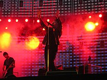 A performance of the song on the Vertigo Tour, when the band re-interpreted it as a commentary on religious violence. U2 Bullet the Blue Sky Vertigo Tour.jpg