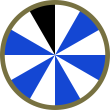 Shoulder Sleeve Insignia of the third 11th Infantry Division. It was made to resemble the face of a clock, with the 11 o'clock position colored black to represent the 11th Division. US 11th Infantry Division.svg
