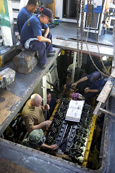 File:US Navy 100831-N-8546L-288 Sailors assigned to Maritime Civil Affairs and Security Training (MCAST) command teach Costa Rican coast guard sailors how to time a 3412 series Caterpillar boat engine.jpg