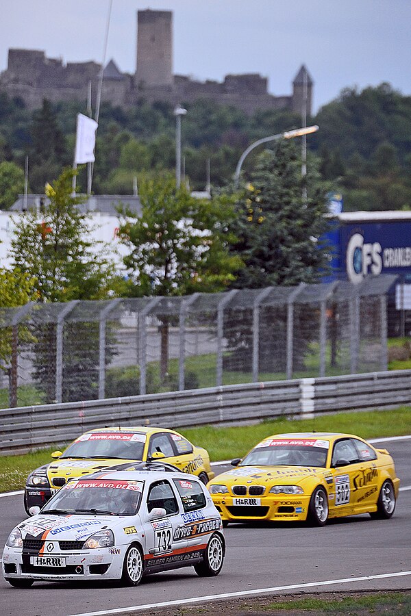 Touring cars passing in front of the Nürburg castle in 2009