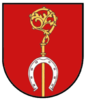 "Honauer Wappen": Golden crook with a silver horseshoe on a red shield.