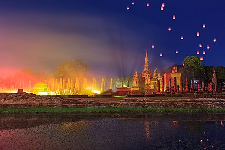 Wat Maha That at night with sky lanterns