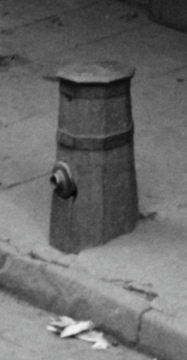 Old style wooden "fire plug" still in use c. 1900