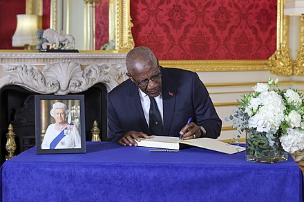 Governor-General Sir Rodney Williams signing the book of condolences in memory of Queen Elizabeth II at Lancaster House, 17 September 2022