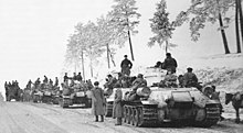 Soviet T-34 tanks await orders to move forward during the Zhitomir–Berdichev Offensive in January 1944