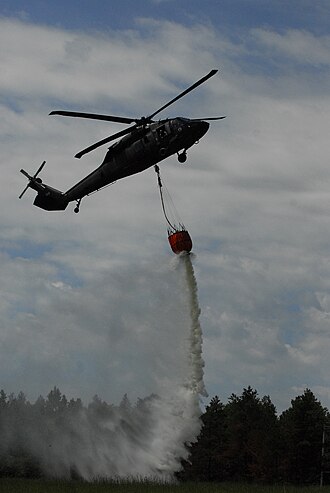 The annual training period of the Combat Aviation Brigade, 34th Infantry Division culminated with the Domestic Operations competition testing flight crew abilities at sling and water bucket operations 21 July 2010 100721-A-7579E-037.JPG