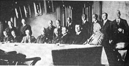 The 1916 United States Assay Commission met on February 9 and February 10, 1916 to test coins from the previous year to ensure they met specifications. Among the members and Mint officials shown were Mint Director Robert W. Woolley (standing fourth from left), Engraver to the United States Mint in Philadelphia Charles E. Barber (standing third from left) and Philadelphia Mint Superintendent Adam Joyce (standing at far right). 1916 United States Assay Commission.png