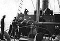 USS Rambler gun crew working the 3"/50 caliber gun off France, 1918