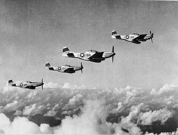 45th Fighter Squadron P-51Ds on an escort mission in June 1945