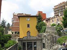 Another view of the sanctuary. Note the bell placed on the roof of the sacristy, to the left of the church, after the small bell tower was demolished. Acquasanta01.JPG