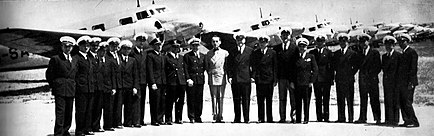 Tadija Sondermajer surrounded by Aeroput's pilots in 1938. The Aeroput fleet in the background is composed of most Lockheed Model 10 Electra and Caudron C.449 Goéland