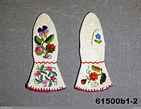 Mittens with traditional embroidery. One of the thousands of photos of Swedish folk dress from the collections of the Nordic museum in Stockholm that we uploaded.