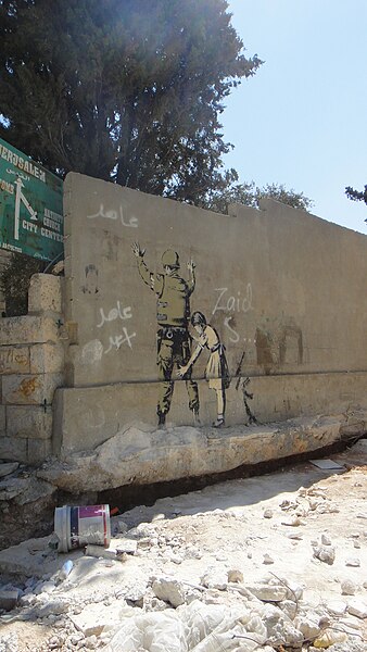 File:Banksy in Bethlehem.jpg