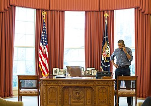 Barack Obama talks on the phone with Russian President Vladimir Putin about Ukraine, March 1, 2014.jpg