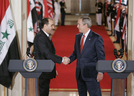 President Bush and Iraqi Prime Minister Nouri al-Maliki shake hands in July 2006