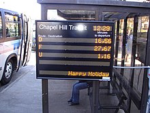 Chapel Hill Transit bus stop with NextBus display board, Chapel Hill, North Carolina Chapel Hill Transit Bus Stop.jpg