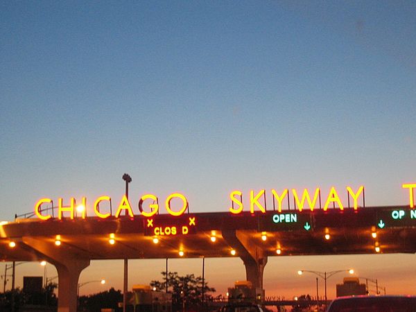 Sunset view of the Chicago Skyway tollbooths at the entrance to the Chicago southbound city limits
