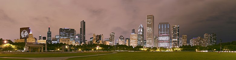 This is an extremely high-resolution image of the Chicago skyline at night as seen from Grant Park. The night this image was taken the Chicago Blackhawks had won the 2010 Stanley Cup, thus several buildings are illuminated in celebration of this.