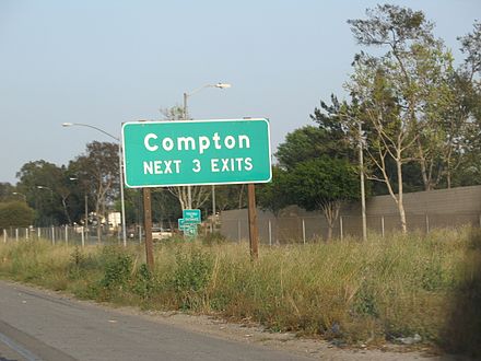 Highway sign for Compton on State Route 91