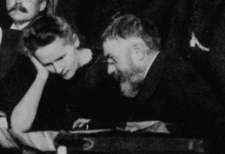 Marie Curie and Poincaré talk at the 1911 Solvay Conference