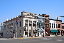 Plymouth Downtown Historic District has been on the NRHP since December 17, 1998. The historic district is roughly bounded by Center, Washington, and Water Streets, and the Yellow River, Plymouth, Marshall County, Indiana. The leftmost building is City Hall, located on the southeastern corner of the junction of Michigan (State Road 17) and Garro Streets. Downtown Plymouth IN 2.JPG