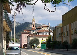 The church and the village, seen from the road