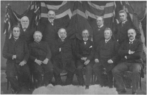 The second cabinet of Emil Stang. Standing from right; Johannes Winding Harbitz, Peder Nilsen, Christian Olsson, Peter Birch-Reichenwald. Sitting from right; Anton Christian Bang, Ole Andreas Furu, Emil Stang, Gregers Winther Wulfsberg Gram, Ernst Motzfeldt, Francis Hagerup. Emil Stangs andre ministerium.png