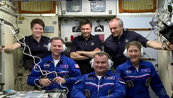 Expedition 59 crew members Anne McClain, Oleg Kononenko, and David Saint-Jacques welcome their new crew members, Nick Hague, Alexey Ovchinin, and Koch